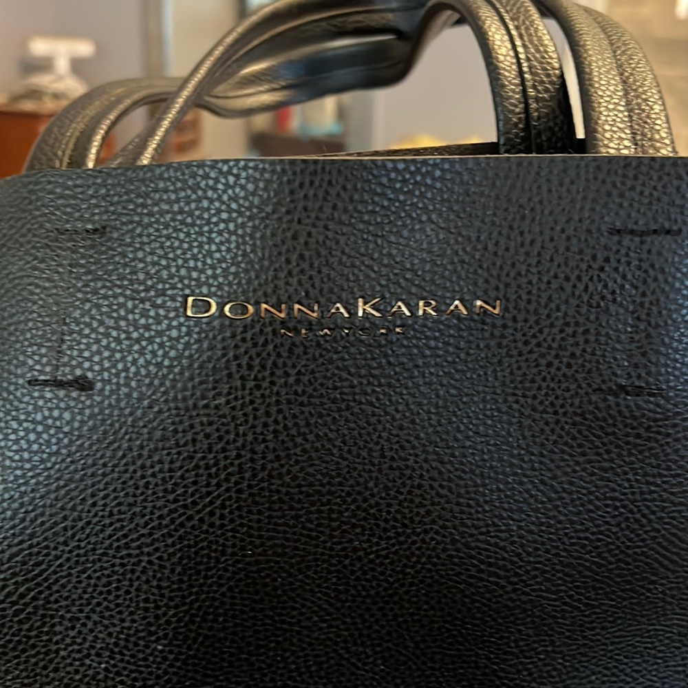 Gorgeous leather shoulder bag by Donna Karan.  Brand New but with no tags
